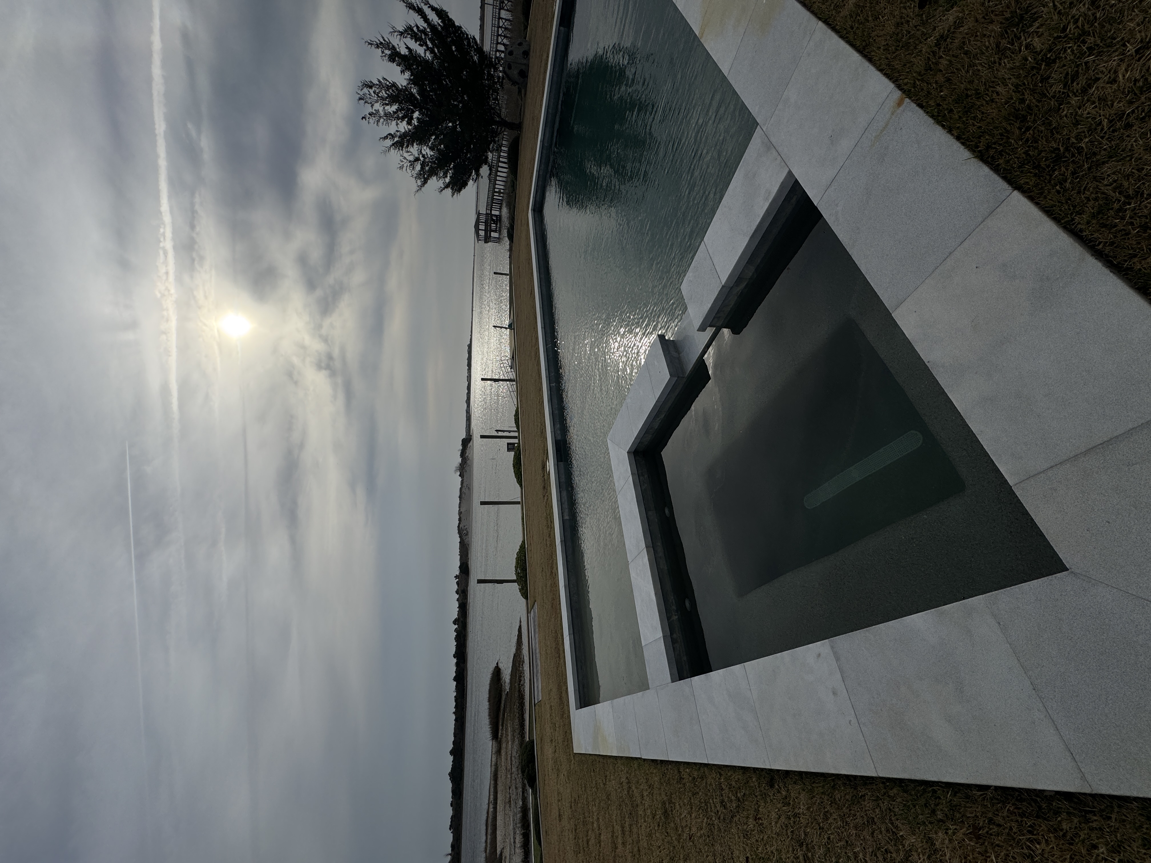 Finished modern pool and spa near Wilmington NC — leak detection complete
